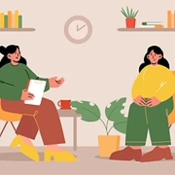 Profesional de salud mental tomando notas durante sesión con paciente en consulta clínica.